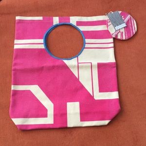 Custom made, multi color tote with circle handle.